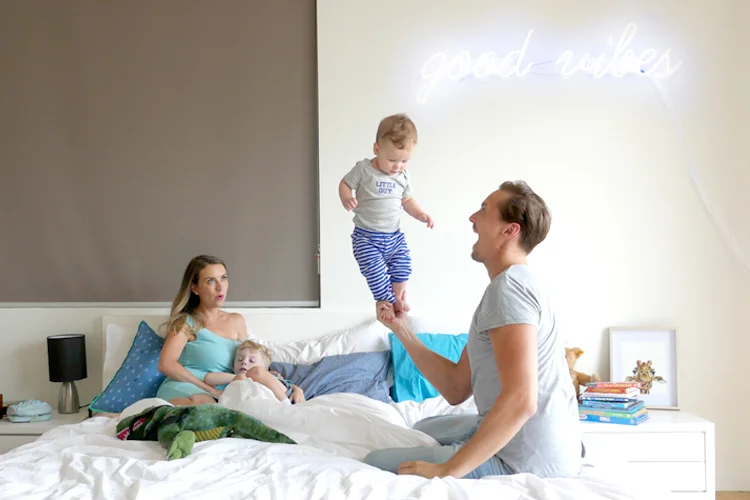 daddy balancing baby