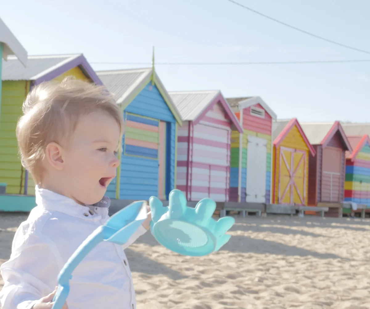 Meg wears Target  dress  and Converse  sneakers , Austin and Remy wear Target  shirts  and shorts similar  here .