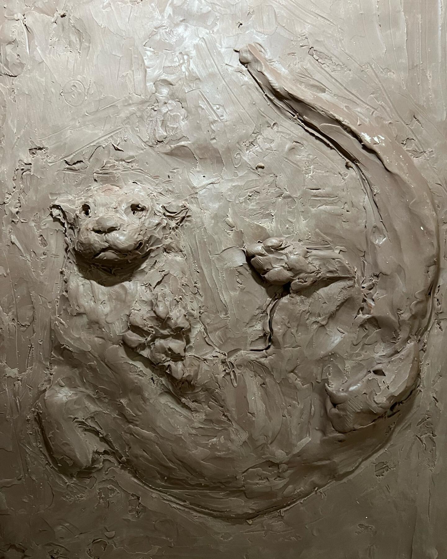 A bas relief otter is appearing! #ottersofinstagram #otter #otterlyadorable #basrelief #basreliefsculpture #animalart #animalsculpture #animalsculptures #monsterclay #nhartist #nhsculptor #figurativesculpture #sculpture #carollakestudios