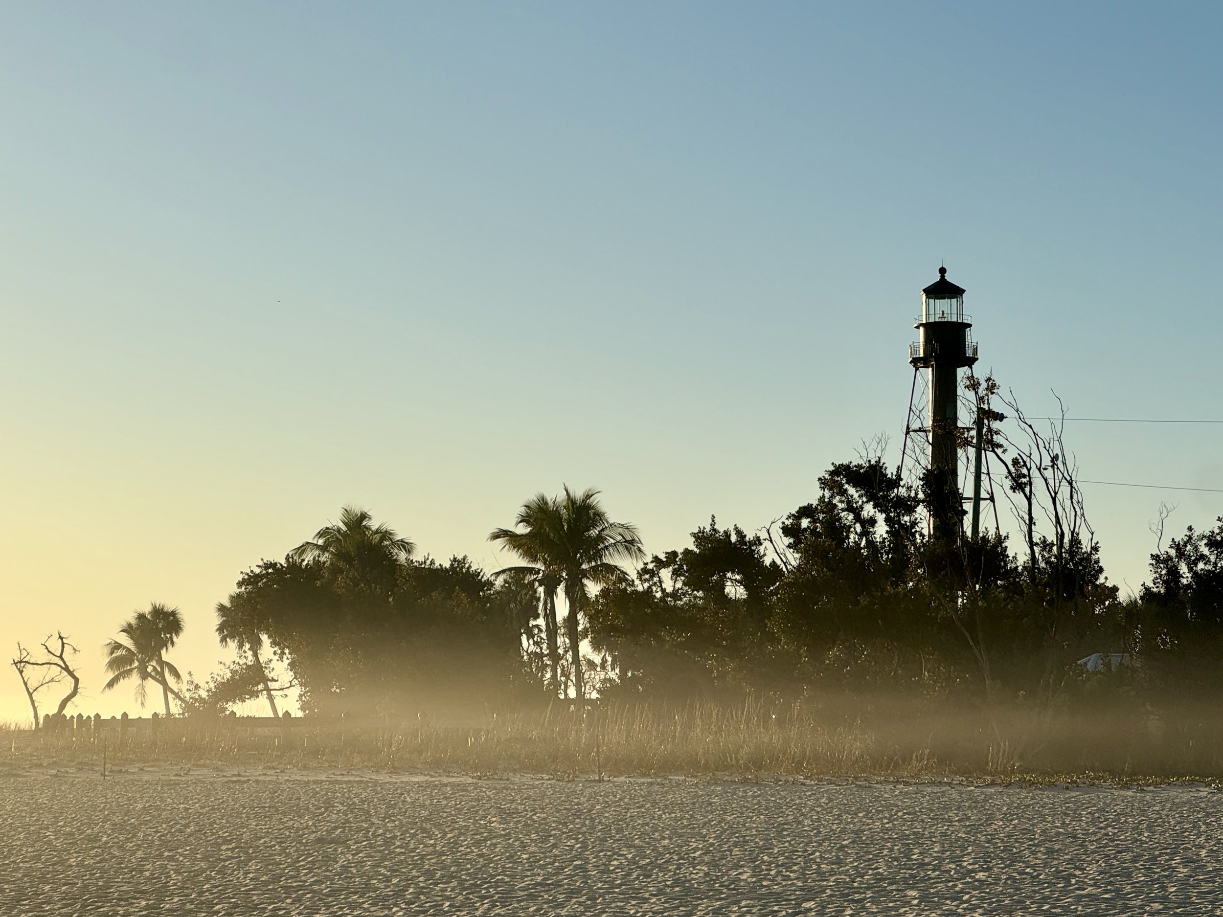 Sanibel Light House in the early morning light and light mist, taken by Carol Lake Studios