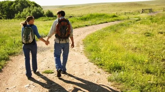 couple walking a path together indicating tools and growth from intensive.