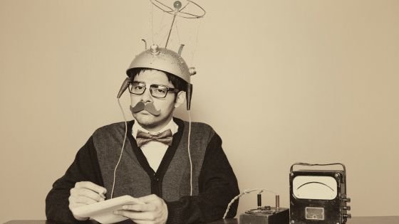 man hooked up to an old computer indicating the myth that AI can make decisions for you.