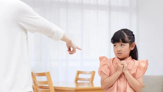 child being scolded indicating how we learned to respond to love.