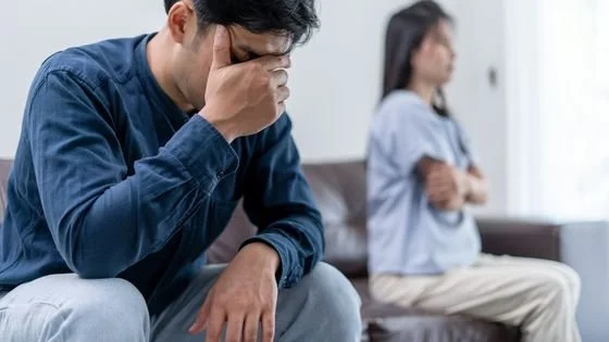 a couple representing two different expressions of being flooded, which can be explored in couples therapy.
