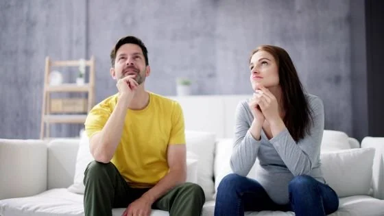 couple pondering why they're stuck and how to get help through an intensive.