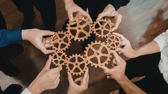 people with gears indicating integrating to work more functionally after a couples intensive.