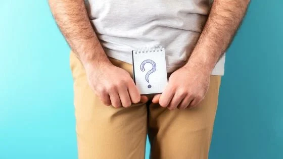 man with question mark over his genitals indicating uncertainty in the area of sex which can be cleared by talking with a trusted party.