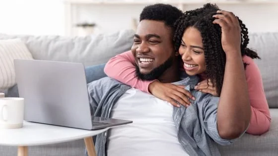 Happy couple working together on HW indicating benefits from intensives