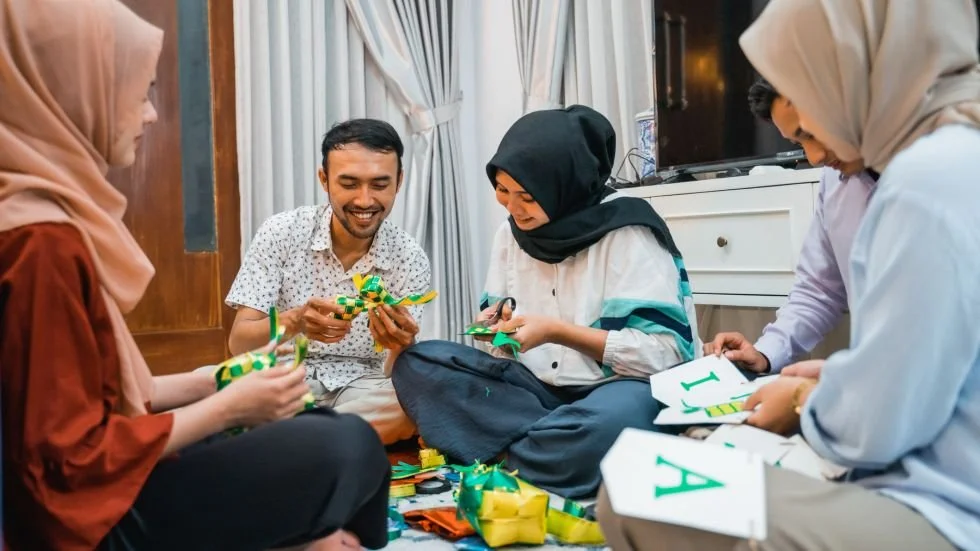 muslim couples making decorations together to depict diversity of how couples celebrate.