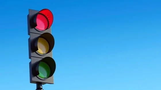 traffic lights indicating using a color-coded system for safety in a scene.