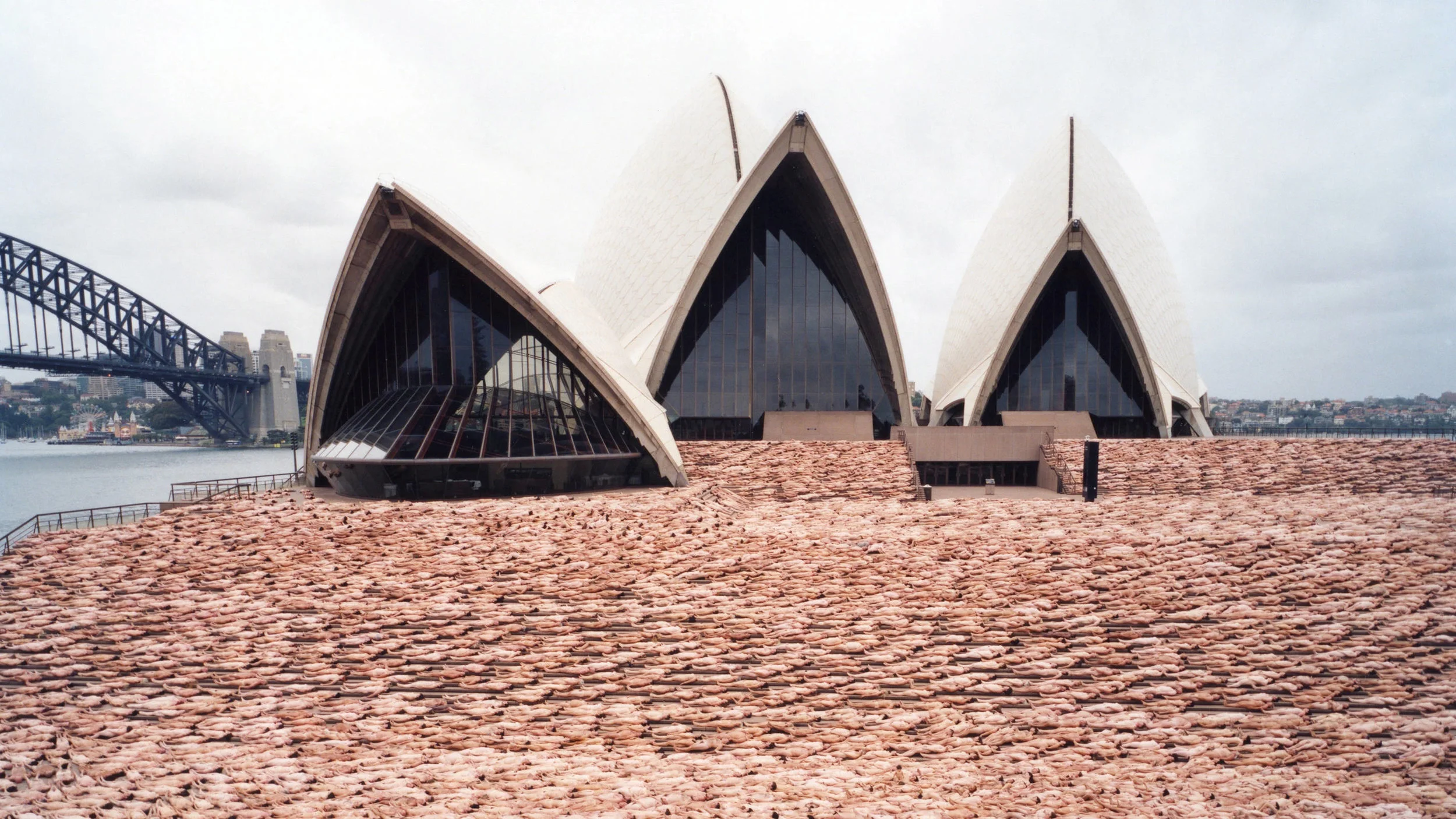When artist-photographer Spencer Tunick was at SITE Santa Fe in 2001, he noticed an older woman, small in stature, telling the people gathered around his work all about it.