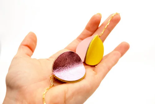 Cold Gold Leather Pom Pom Statement Earrings in Mattel Pink