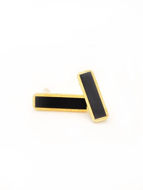 Cold Gold long bar geo studs in black.