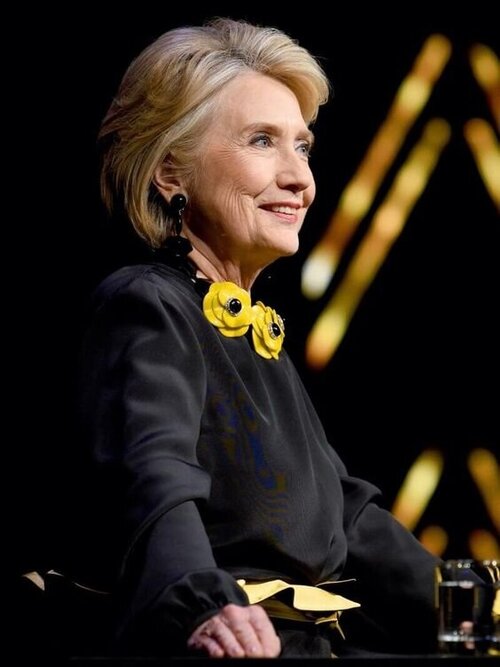 Hillary Clinton looking powerfully Scorpio in all black via iamandco.com.