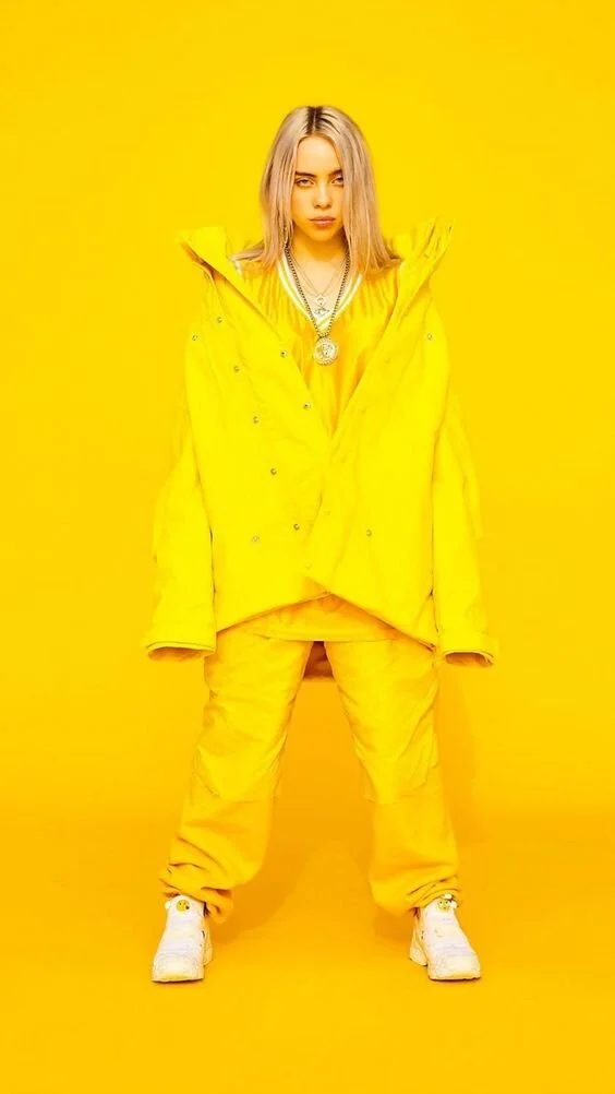 Billie Eilish, Sagittarius and vision in yellow via PInterest.