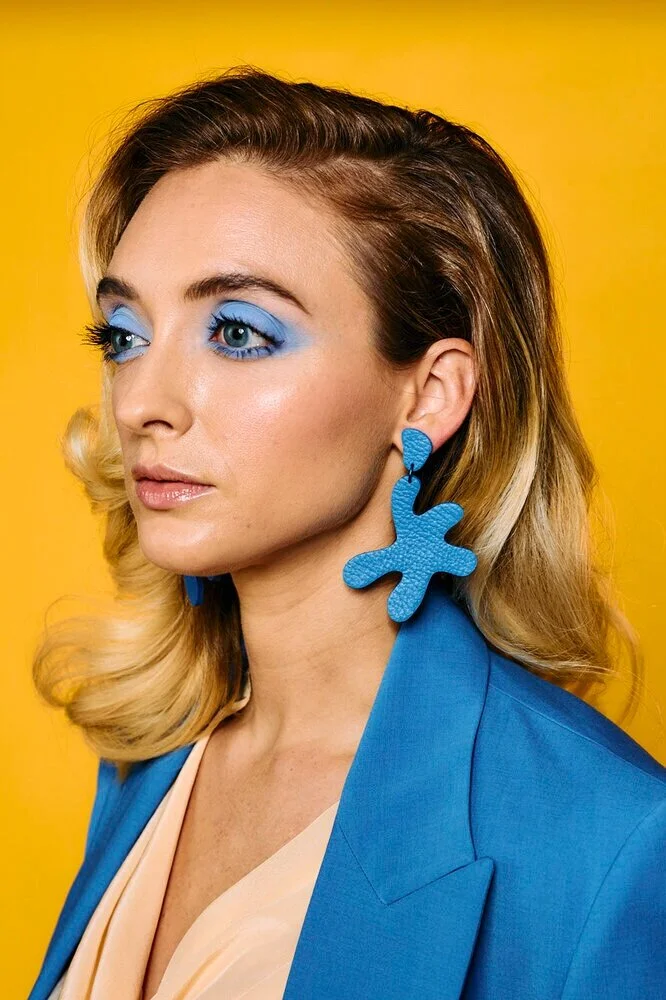The point move leather statement earrings in matisse blue.