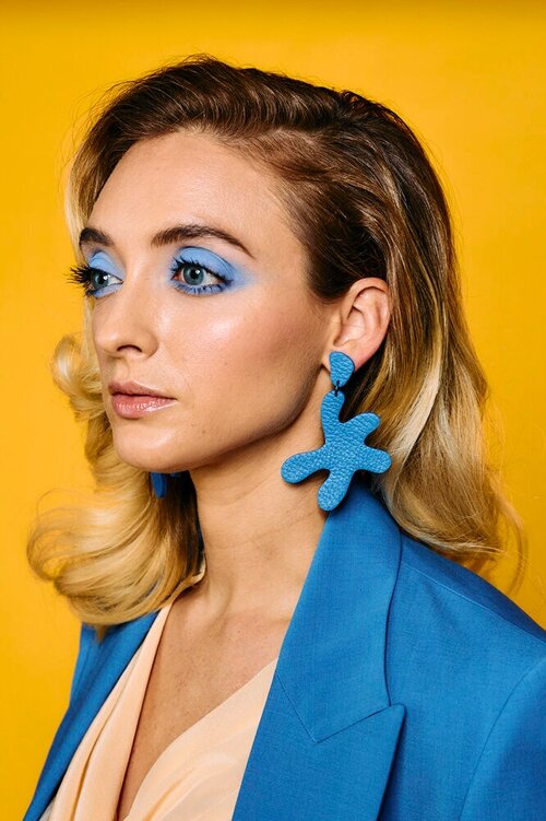 The point move leather statement earrings in matisse blue.