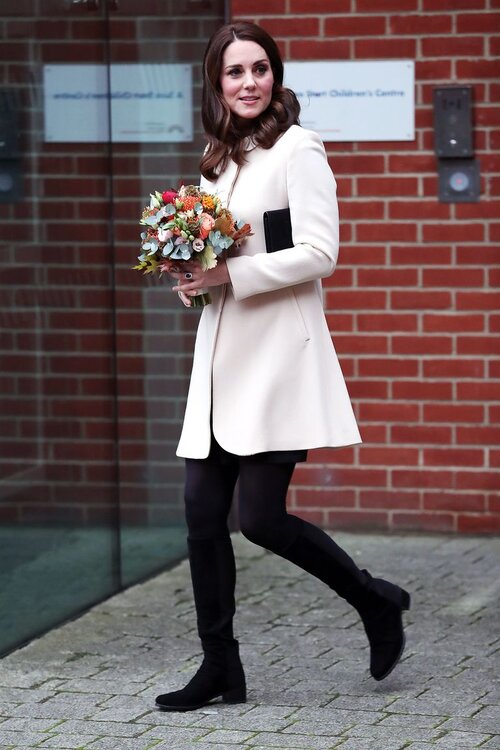 Duchess of Cambridge, Kate Middleton, in a dreamy yet practical white + black combo via Harper’s Bizzare.