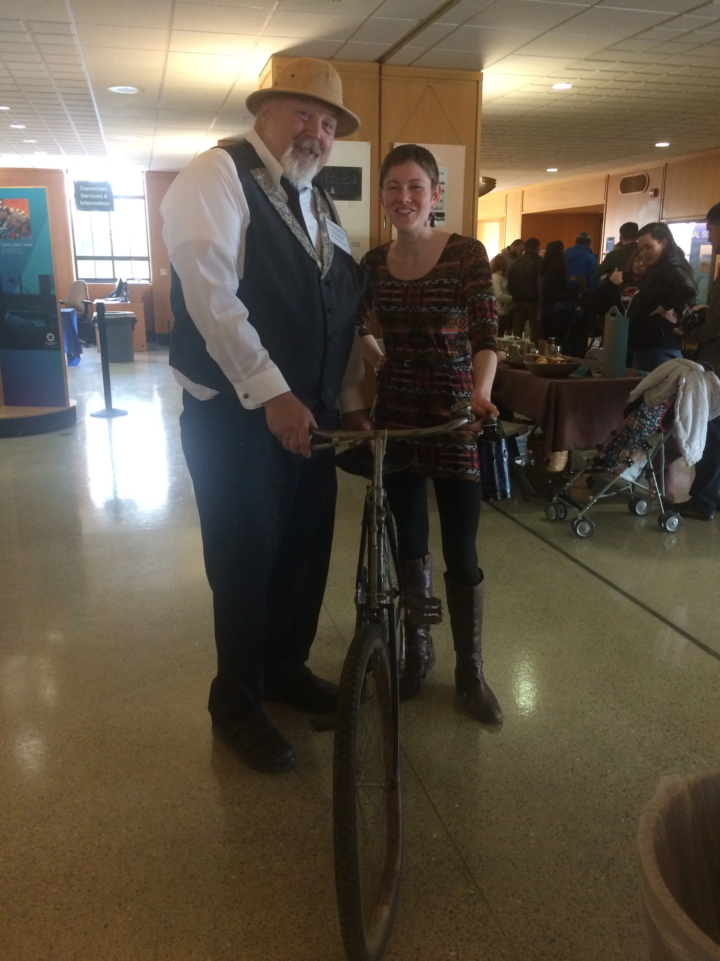 Cayla with Governer T.T. Geer and his beloved bicycle. 