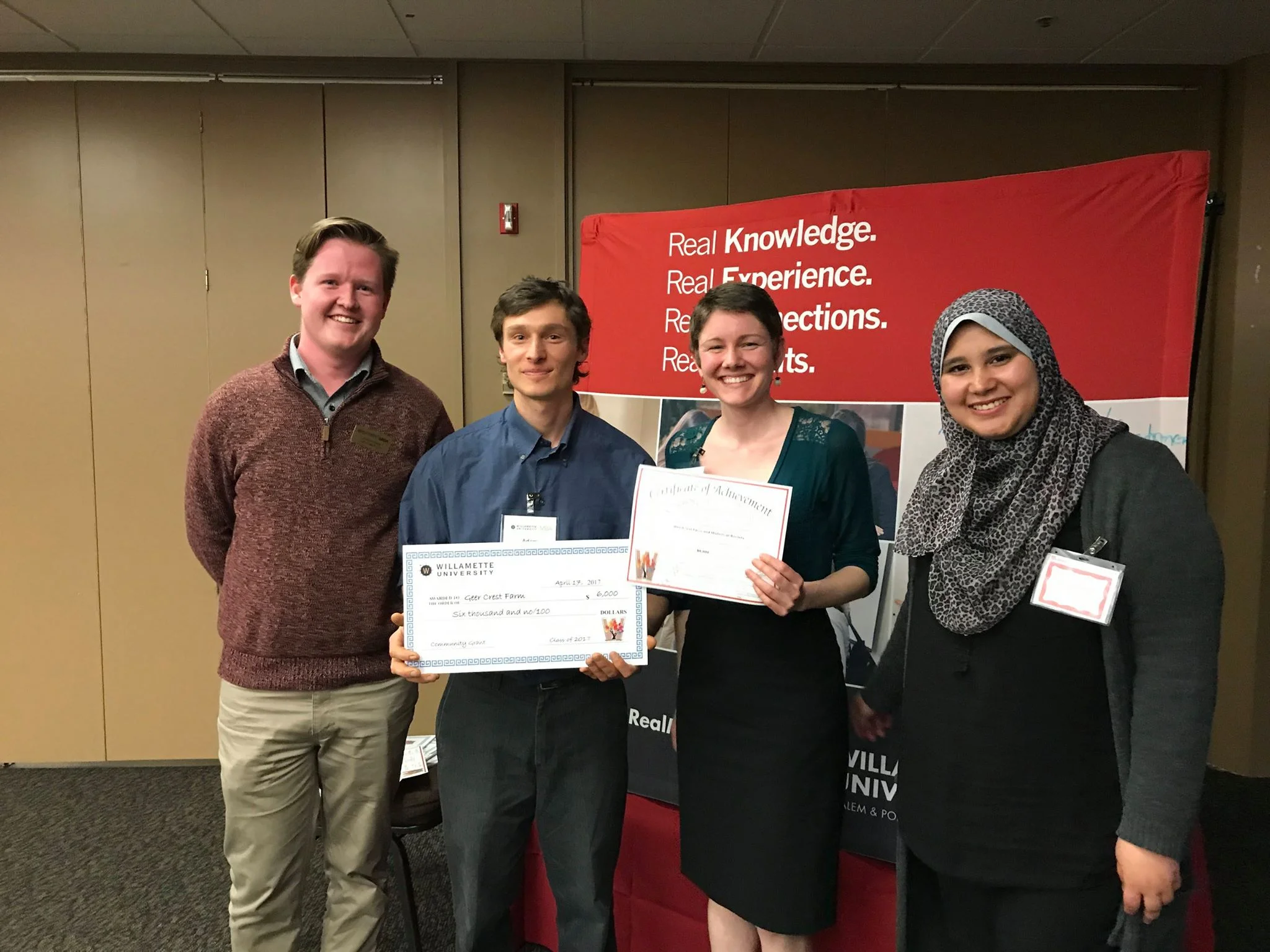 Adam and Cayla (in the middle) along with Students from the MBA program. 