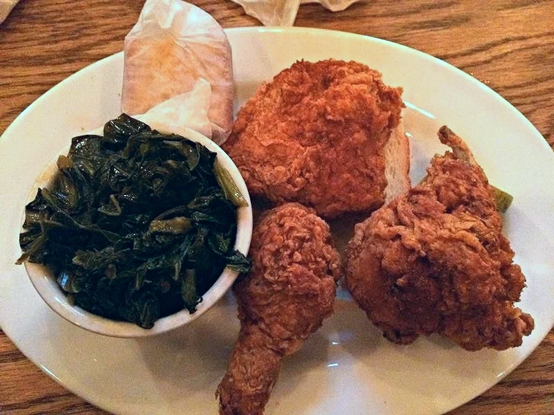 plate of hot chicken and collards at peaches hot house