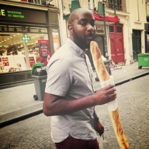 Me, having a very spiritual moment with a baguette in Paris