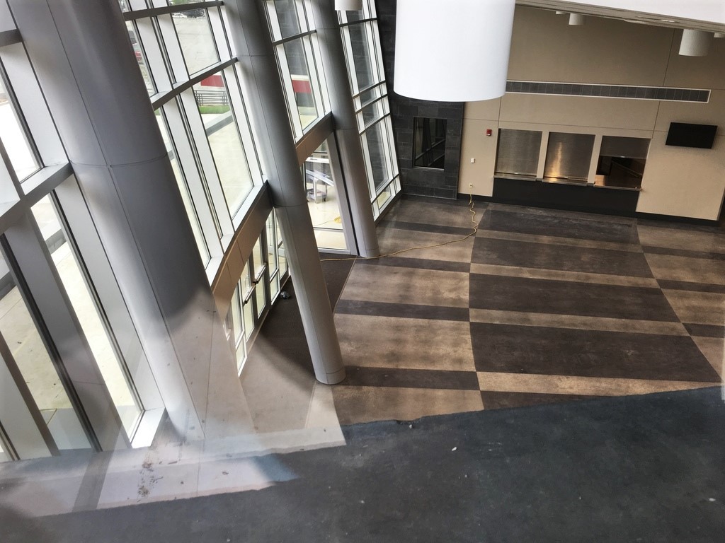 A unique view of the pre-function lobby. Notice the stained concrete pattern.