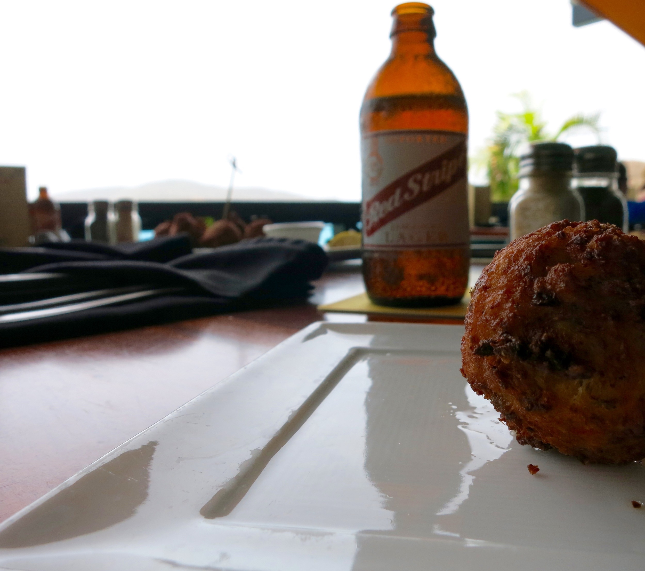 Lunch. Conch Fritters and a Red Stripe