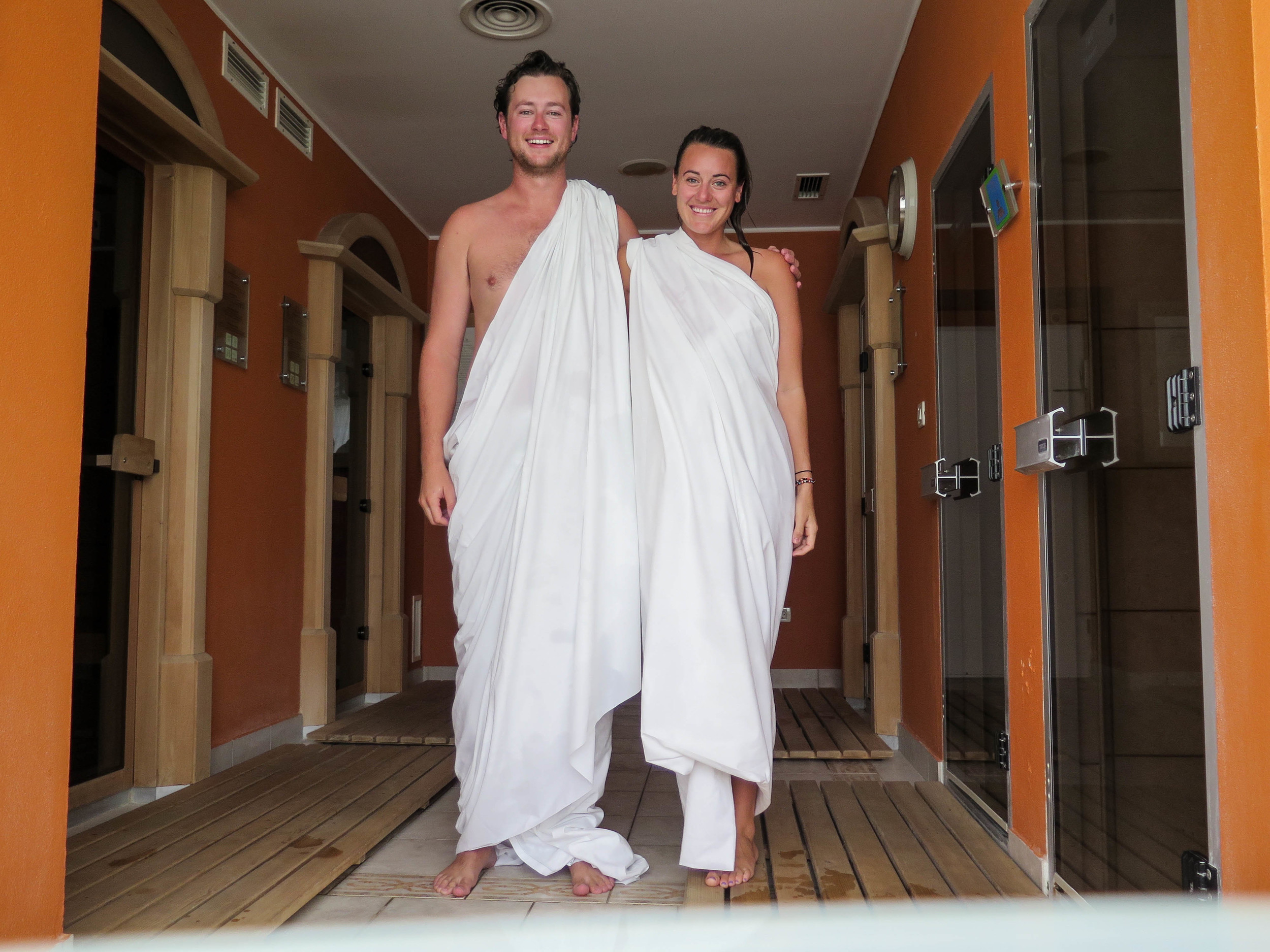 All smiles wearing our "togas" in the saunas.