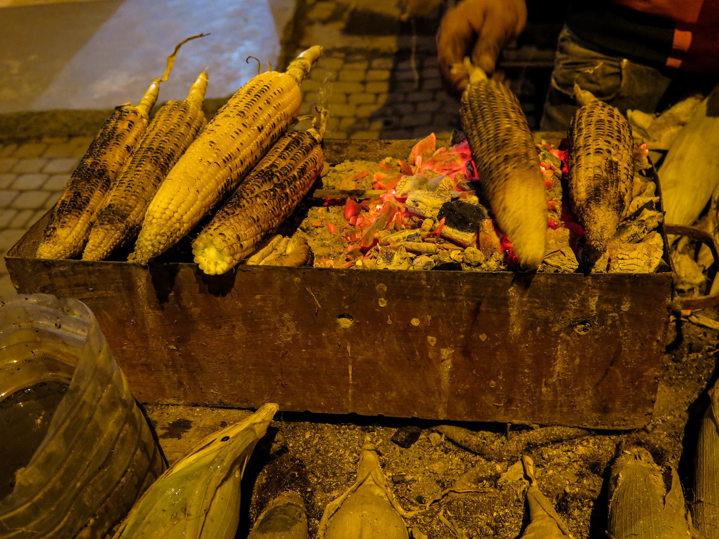  Fire roasted corn dipped in salt water 