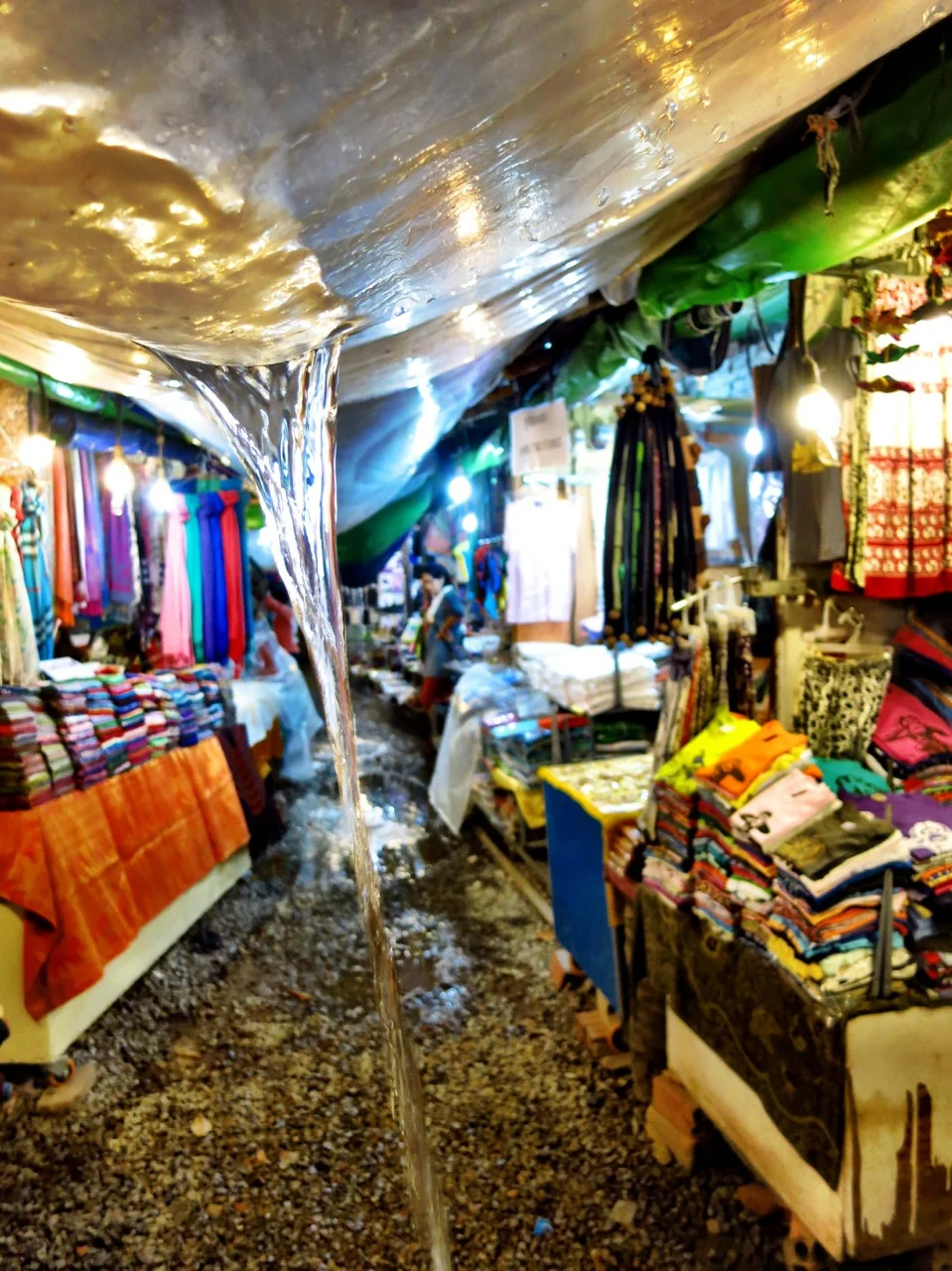 Rain poured as we wandered through the Night Market.