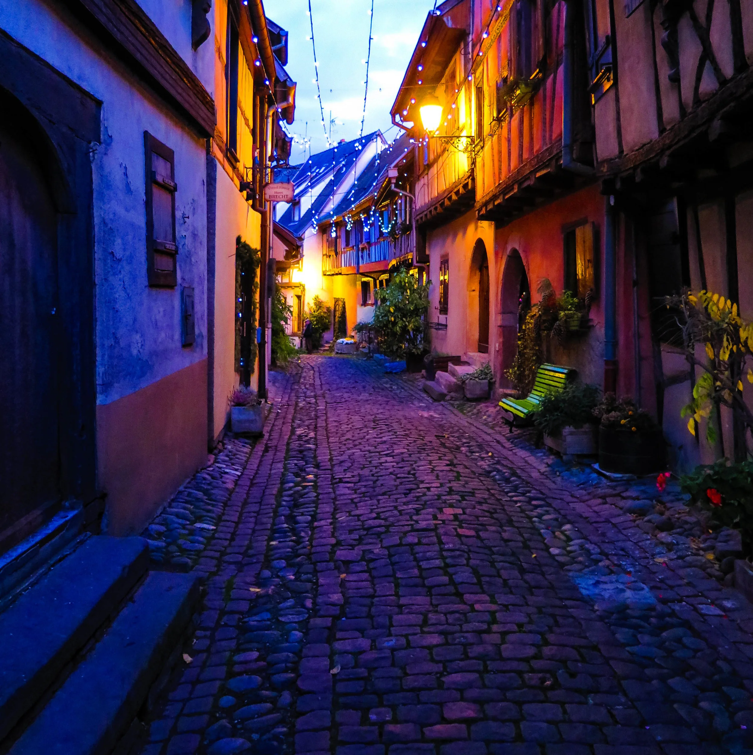 The cobblestone streets of Eguisheim at night.