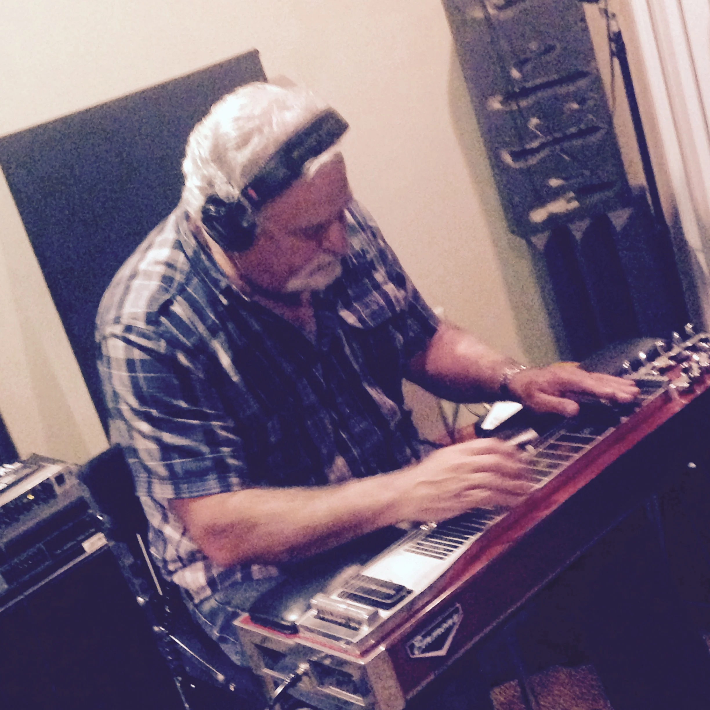 Tom "Footy" Husting on pedal steel.