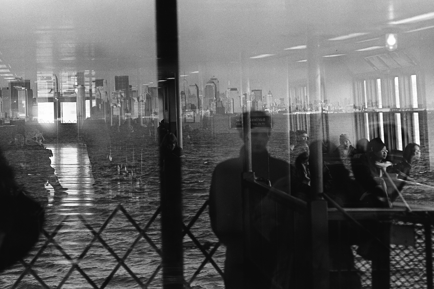   Reflection in a&nbsp;window of the Staten Island ferry  New York, NY. &nbsp;2002 