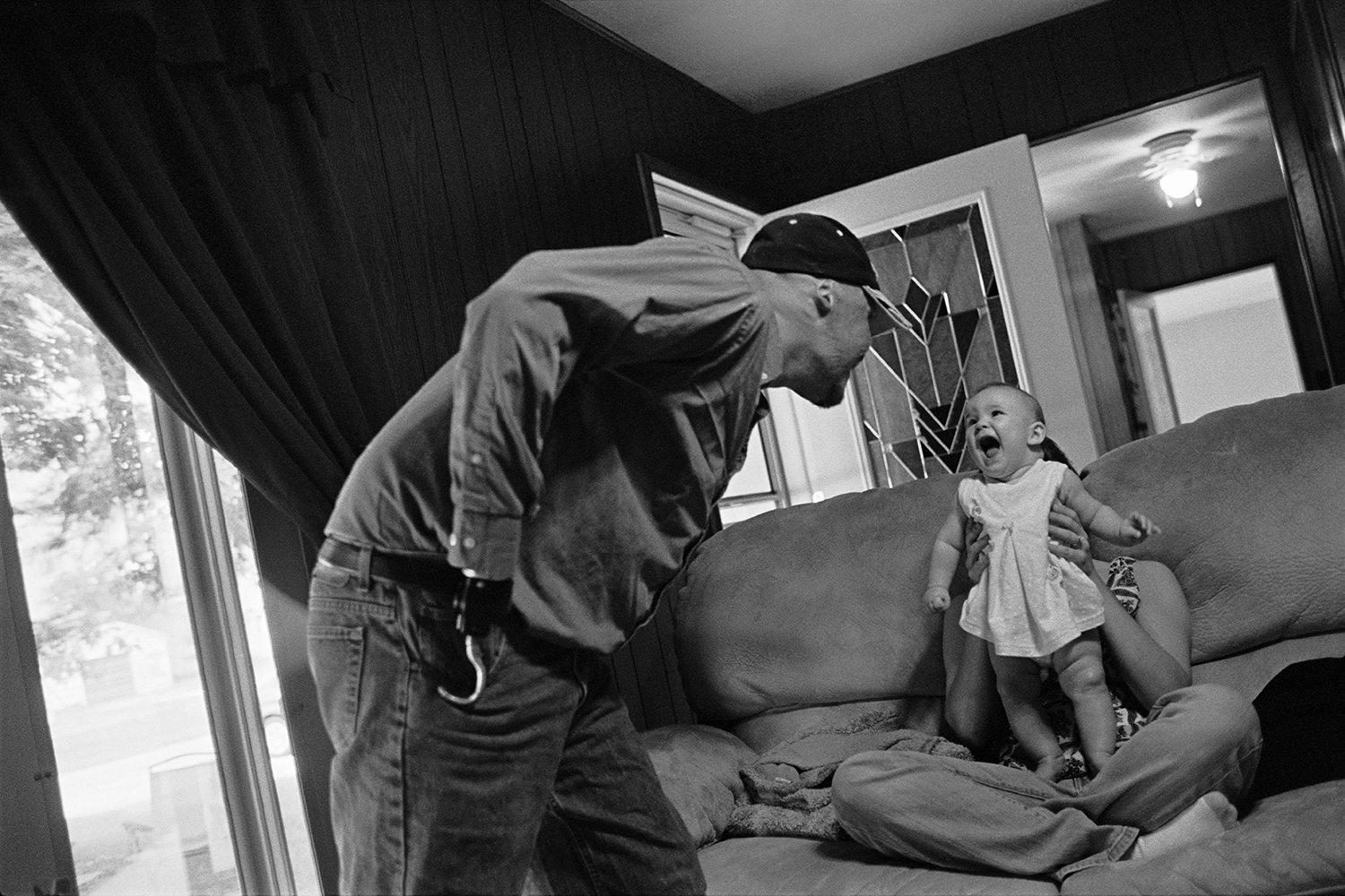   Injured Iraq War veteran Dustin Hill with his daughter and wife  Mineral, IL. &nbsp;2008 