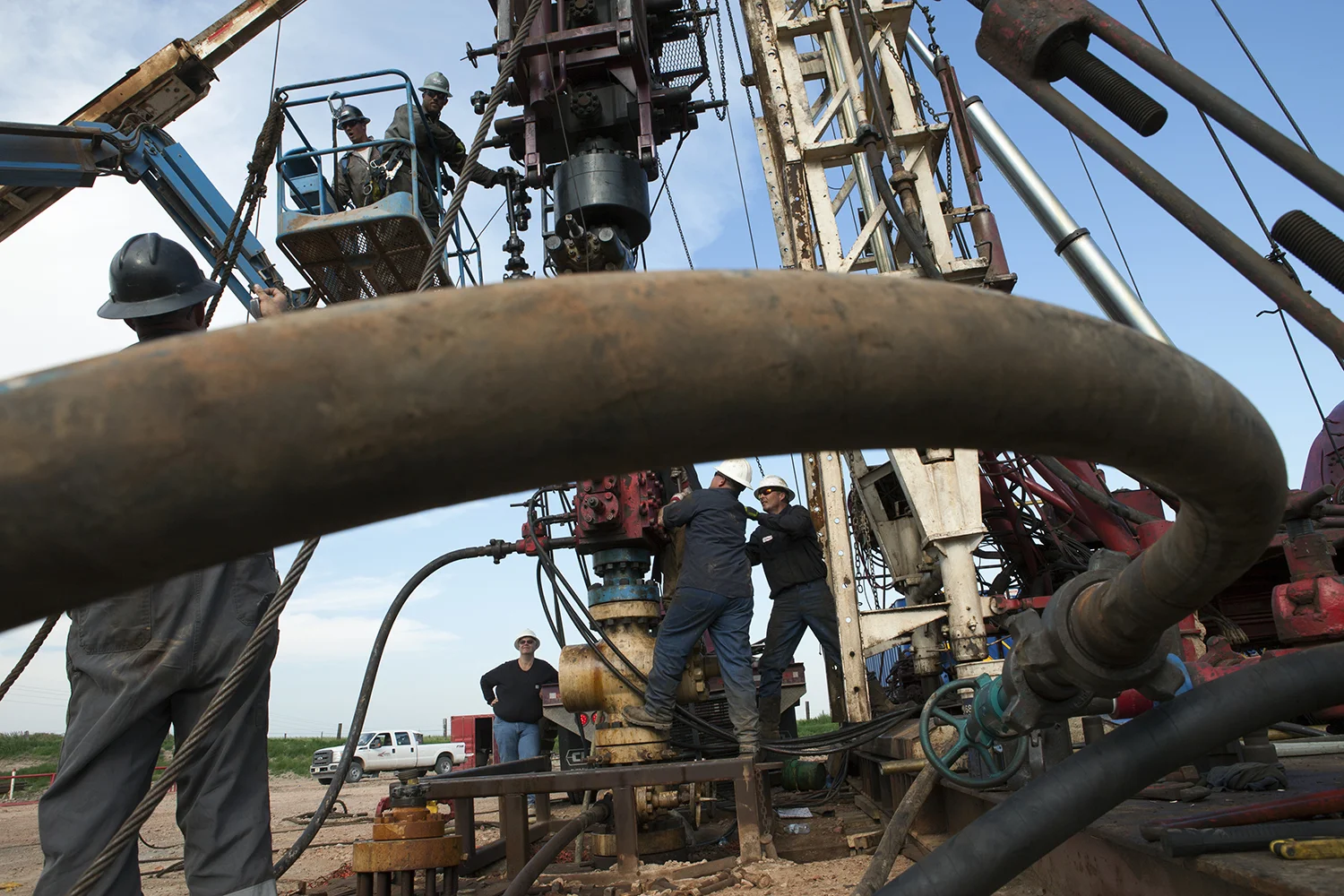 A workover rig set up to improve oil extraction Epping, ND. 2012