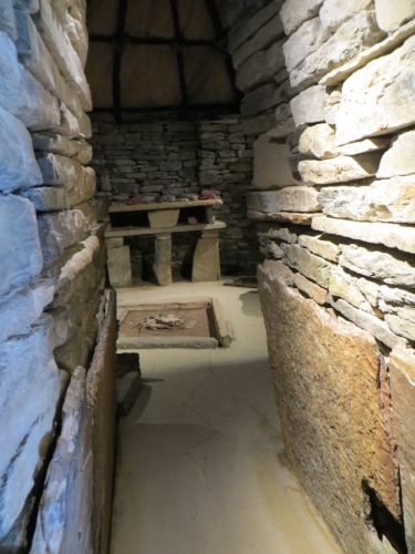 ...you can get an idea of what it was like to live here, from this reconstruction. Note the roof of hides. 