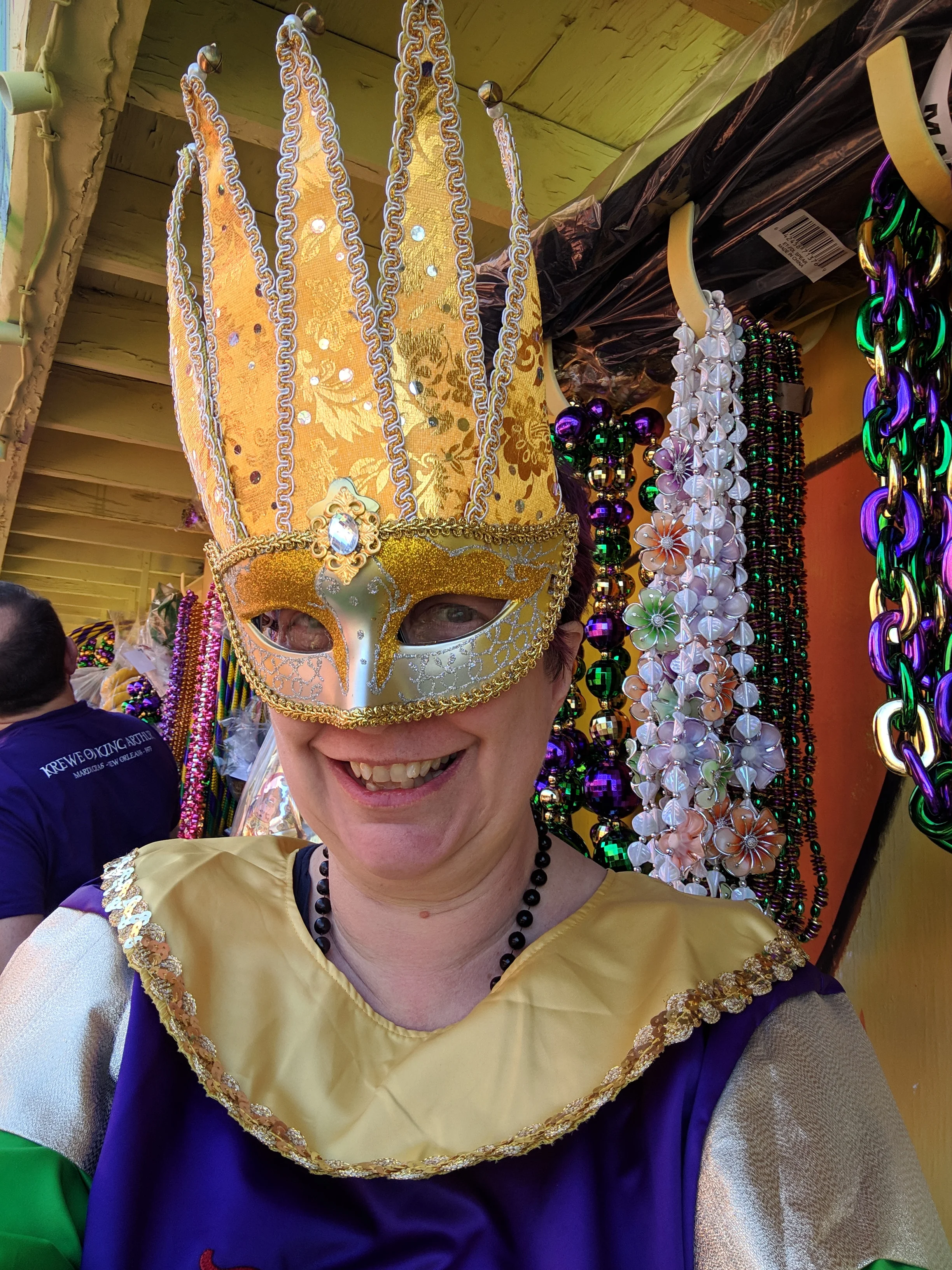 Our tunics mark us as Krewe of King Arthur; our masks tell you who’s in charge of our particular floats.