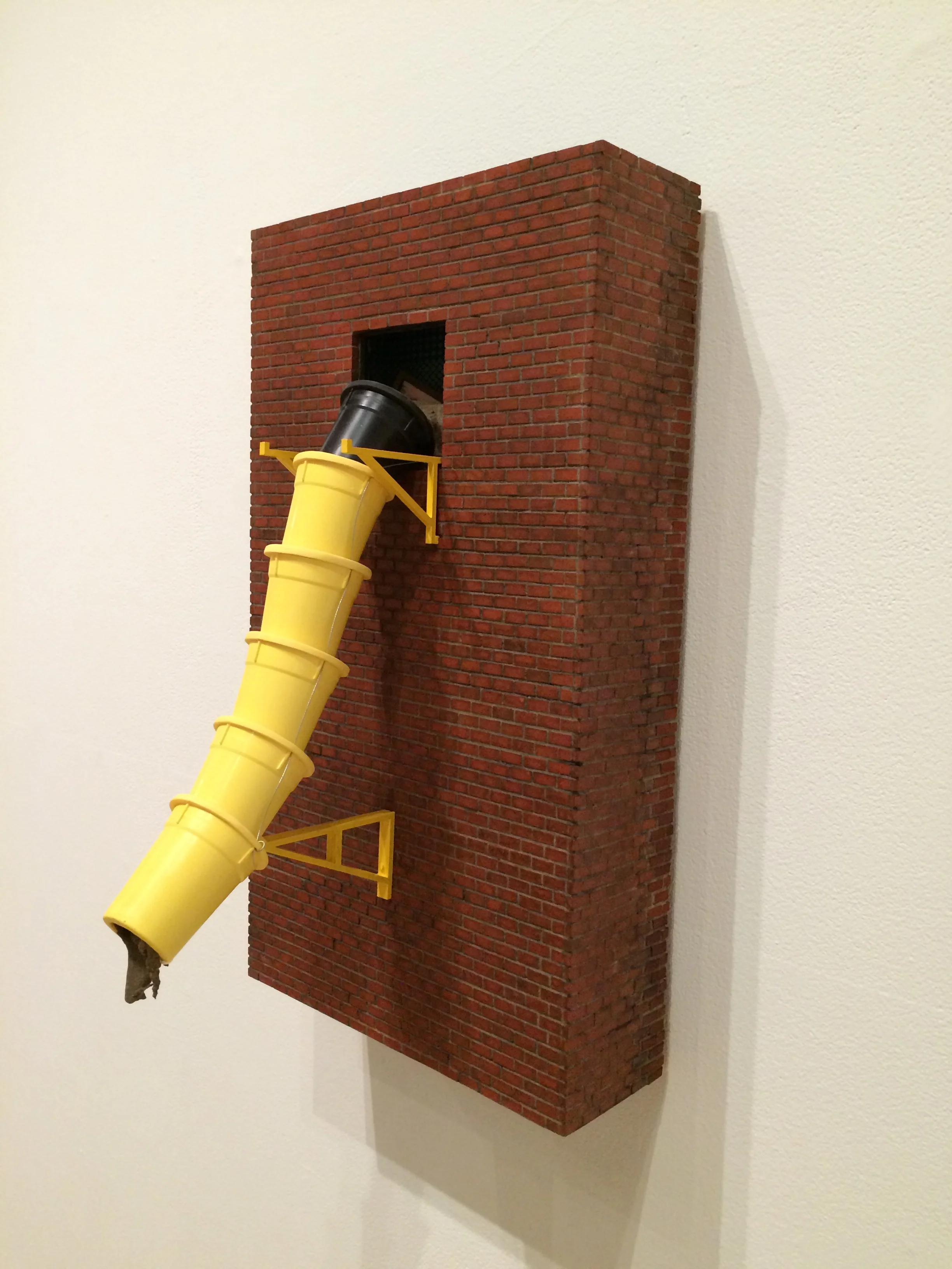    ‘Paul Bremer’ –   Right Oblique   Wood, cast plastic, chipboard, acrylic, mdf, wire, foam, sand, ink  14”W x 24”H x 6”D  2016 