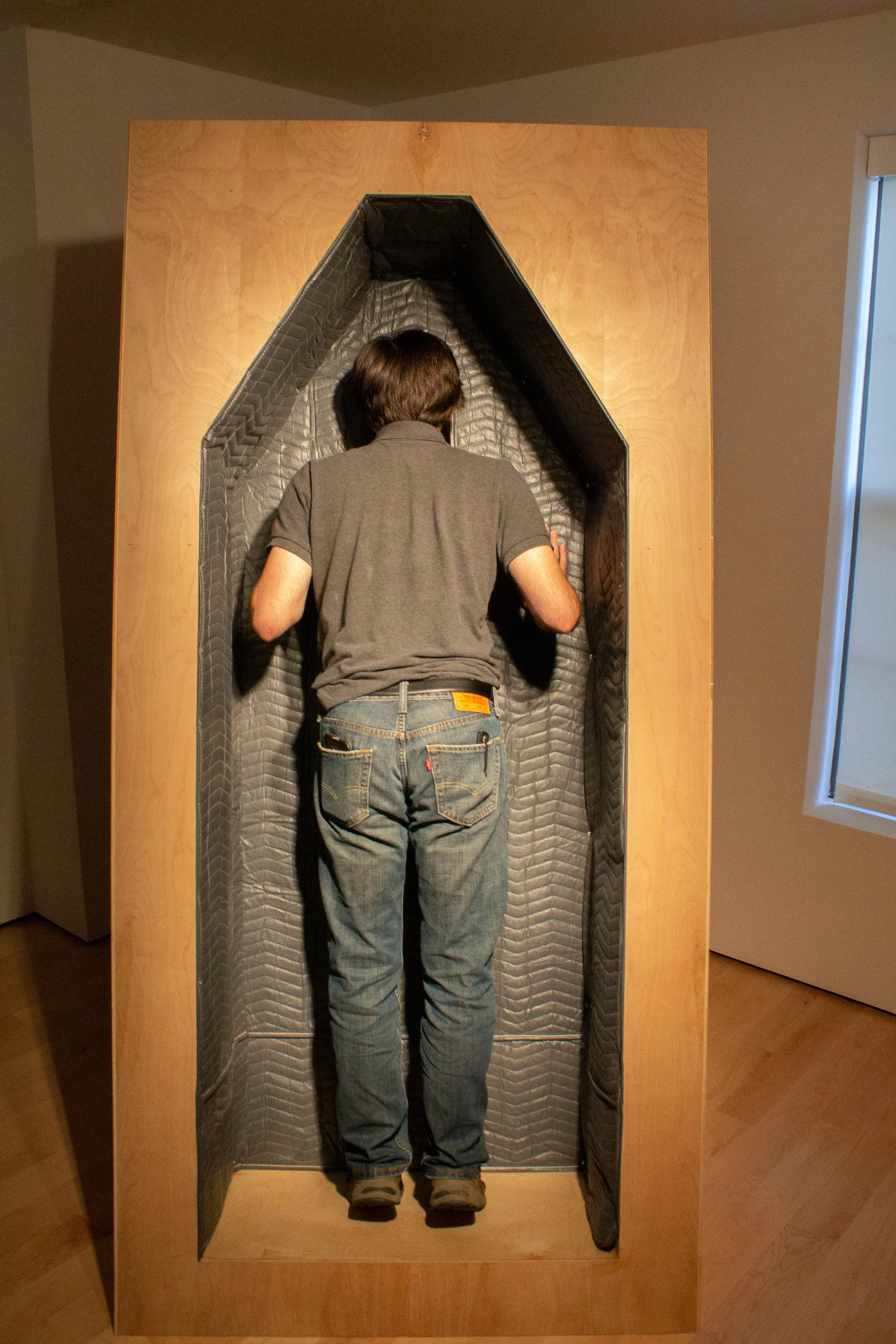 'Neil Before Zod- OSS (One Smal Steppe) Viewer Orientation Detail' Wood, elevator padding, interior vignette, audio track 3.5’W x 7’H x 5.5’D 2018 Photo courtesy of Rick McLay