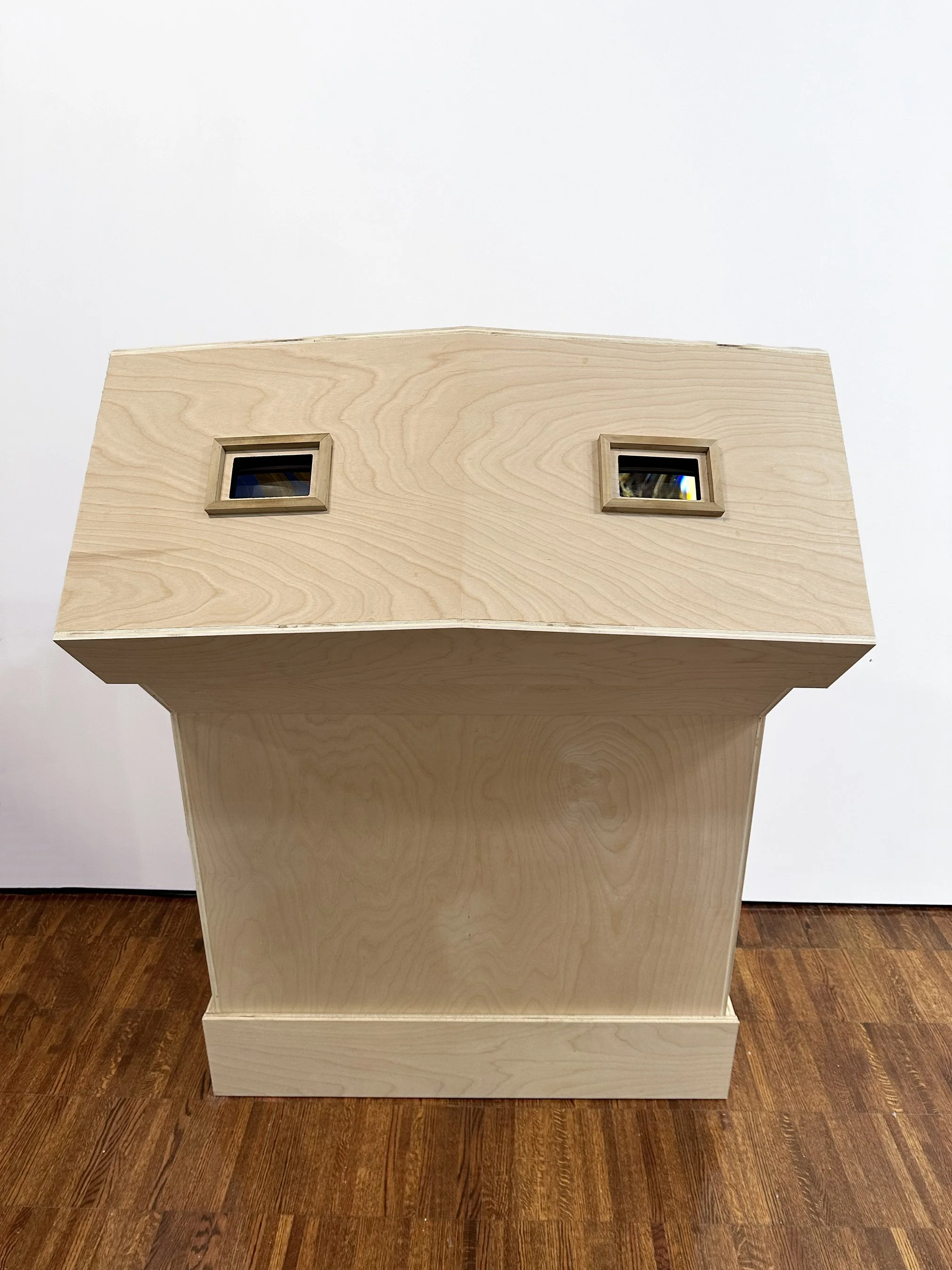    Eyes of Your Eyes – Exterior Periscope   Wood, digitally produced elements, paper, acrylic, lights, lens  40.75” W x 56” H x 27” D  2025 