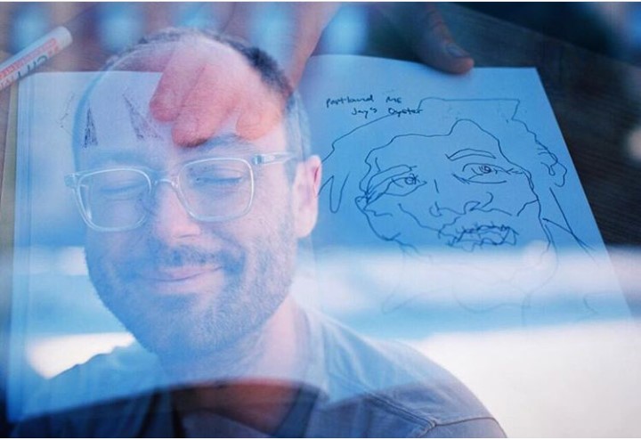 Jeremy and his sketchbook. Photo by Photo by Craig Scheihing.
