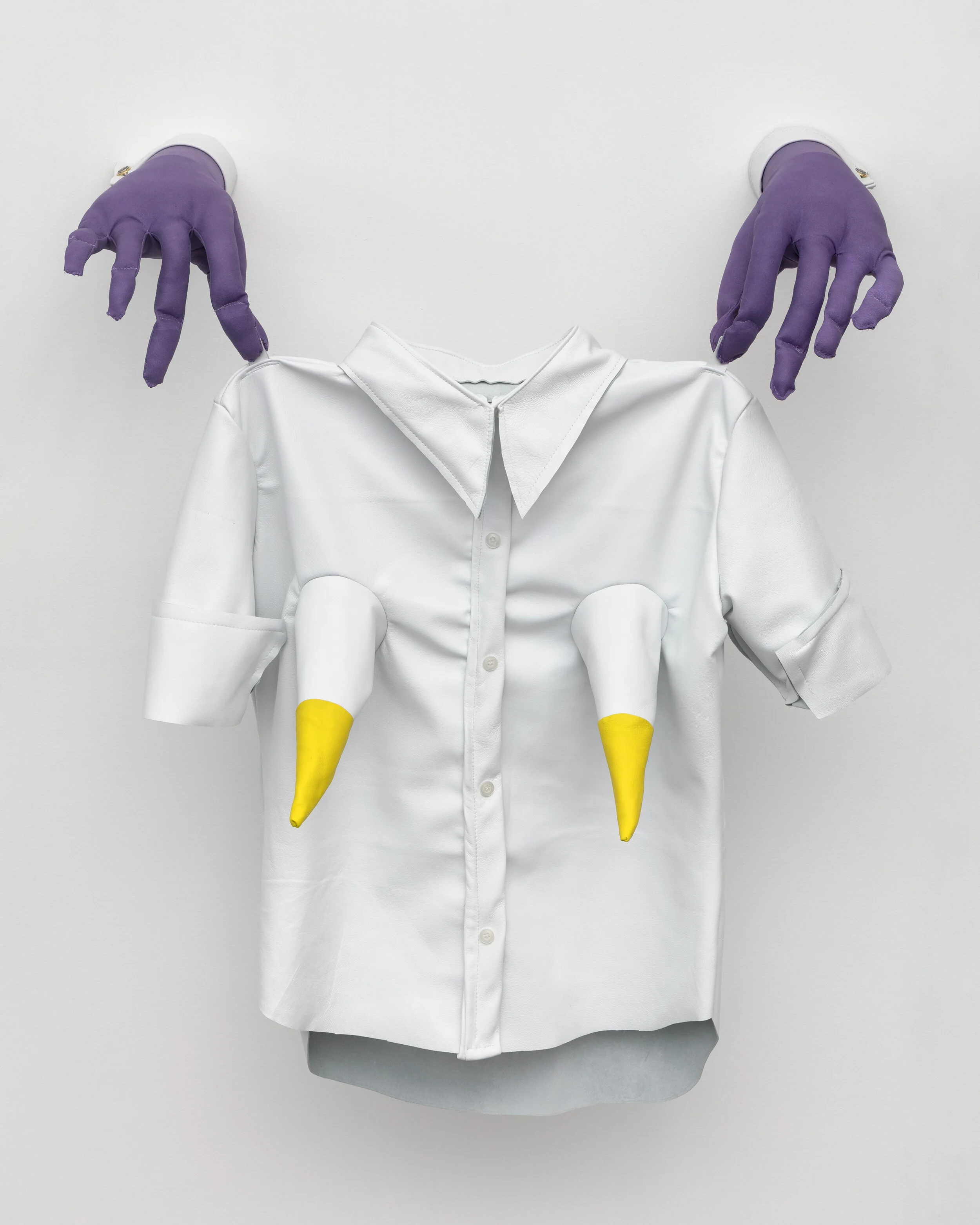 Hung Out to Dry, 2019. Leather, thread, polyfil, buttons, wire, wood, magnets, 25 x 13 x 27 inches