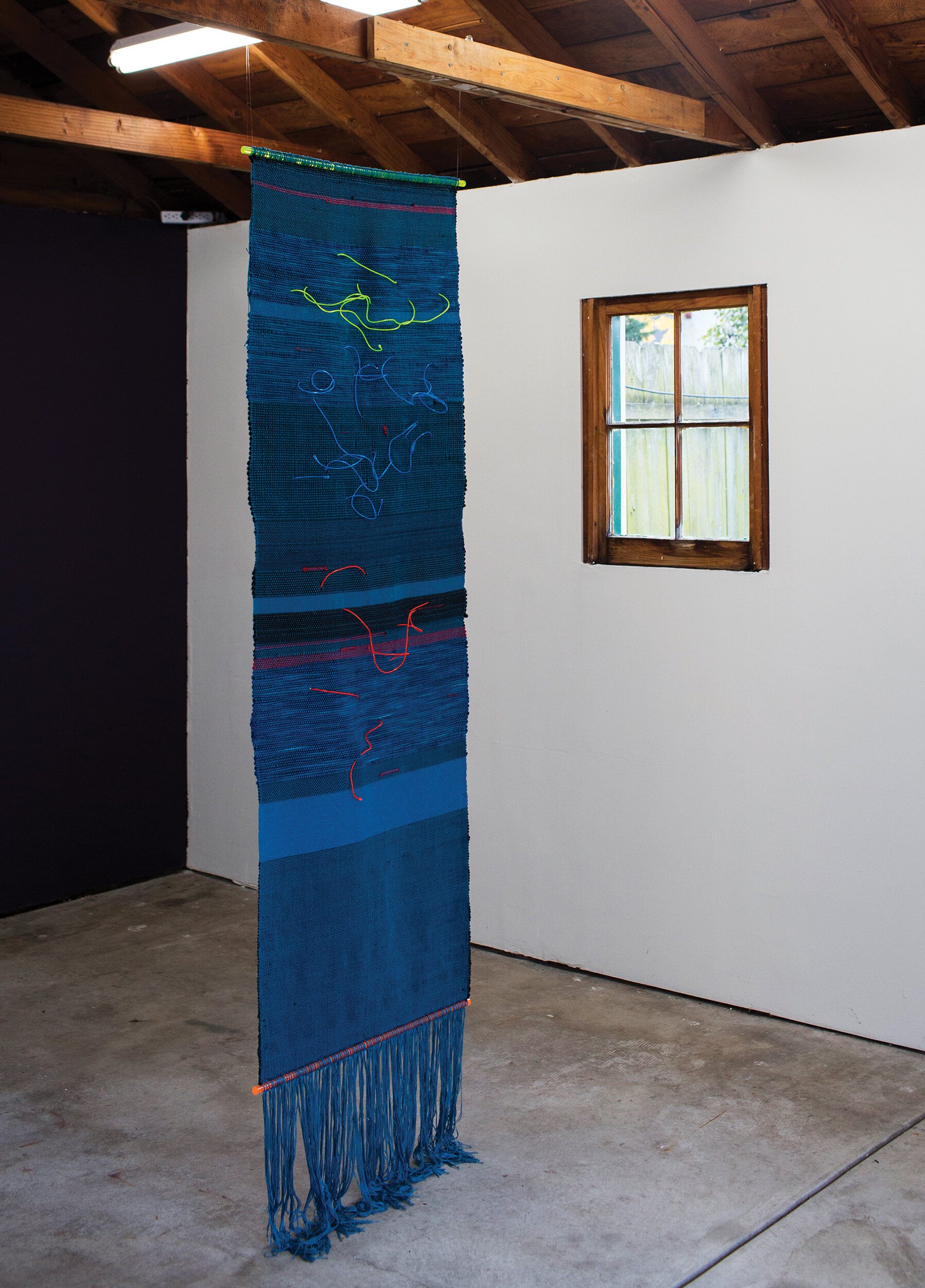 blue nile (for alice), 2017, hand-woven textile: natural and synthetic fibers, electroluminescent wires, acrylic rods, battery packs, 22in x 72in x 2in