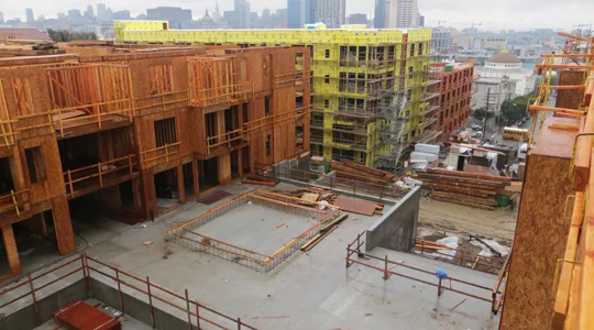 In this construction photo of Waller Park the belvedere walls, steps and a large depression for tree planting can be seen. With the majority of the project built on top of a parking garage, Meyer + Silberberg collaborated closely with the architects and structural engineers to design a recess in the structural slab to be filled with planting soil and allow the park’s ginkgo trees to reach full size and health.