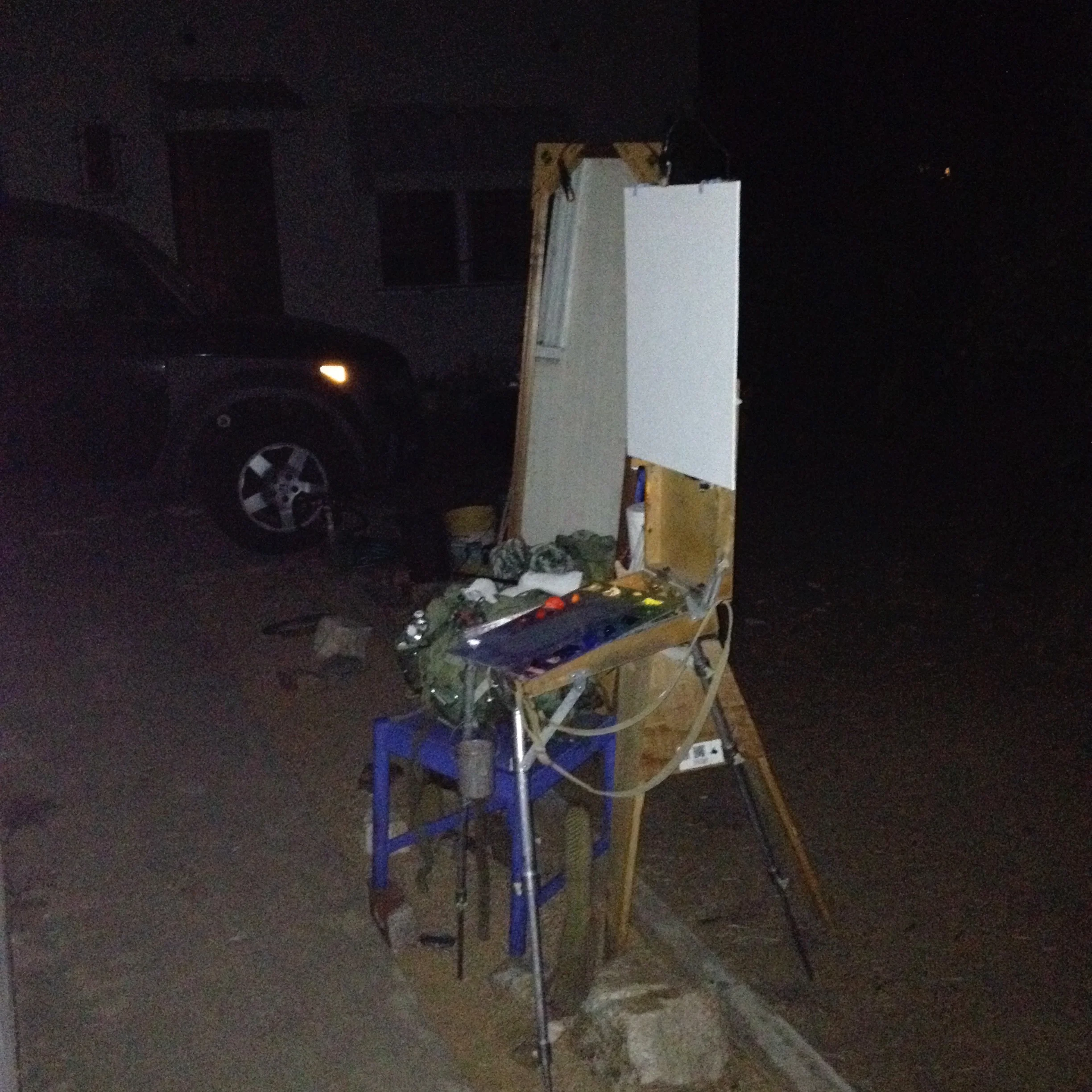 The setup used for painting my Self-Portrait in Moonlight. Mirror sitting on a chair to the left of my easel. I used a full color palette.