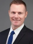 Mr. Justin Richardson , Managing Partner