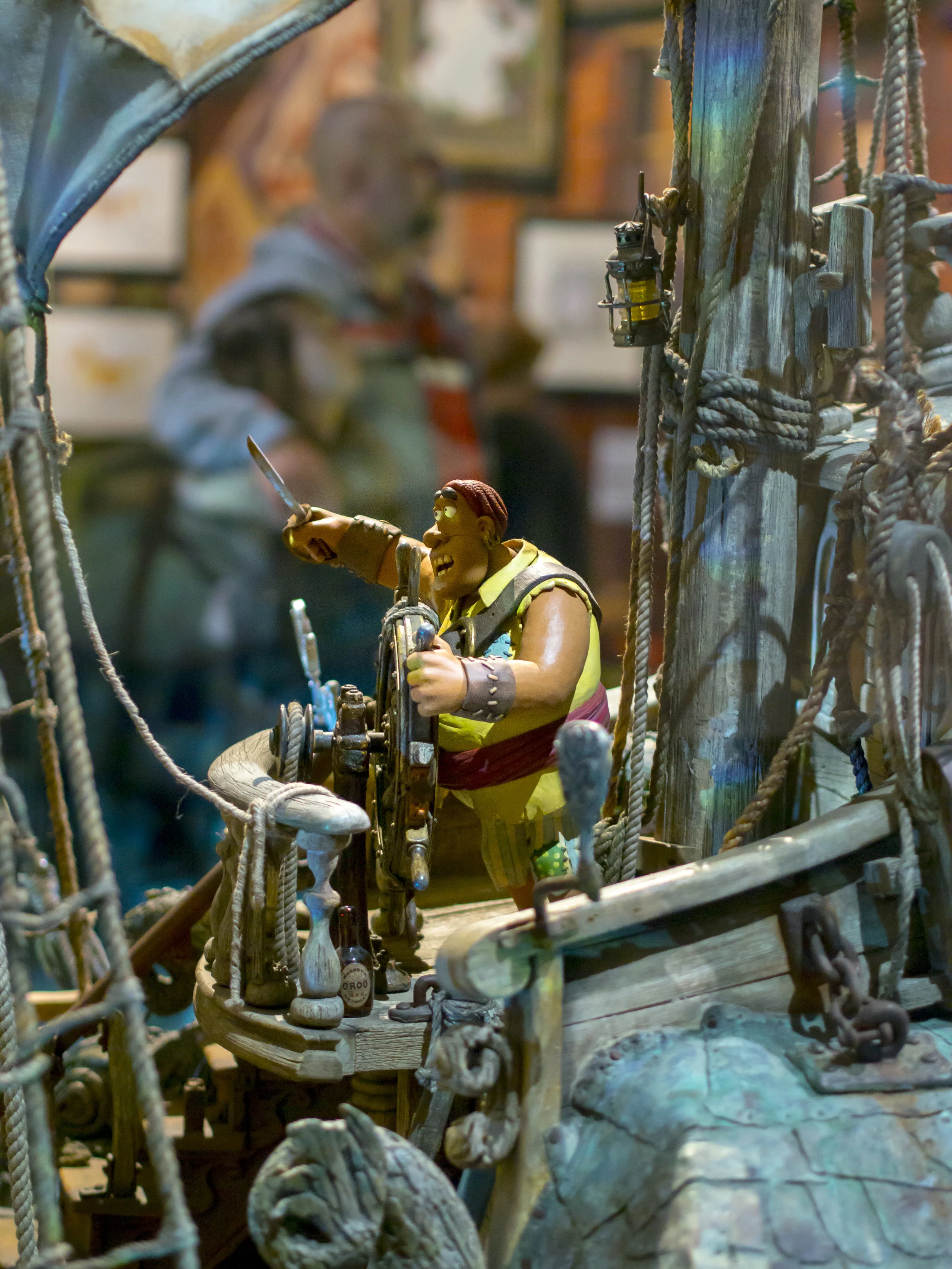 The figure behind the wheel is about 20cm tall and the ship is complete from stem to stern.