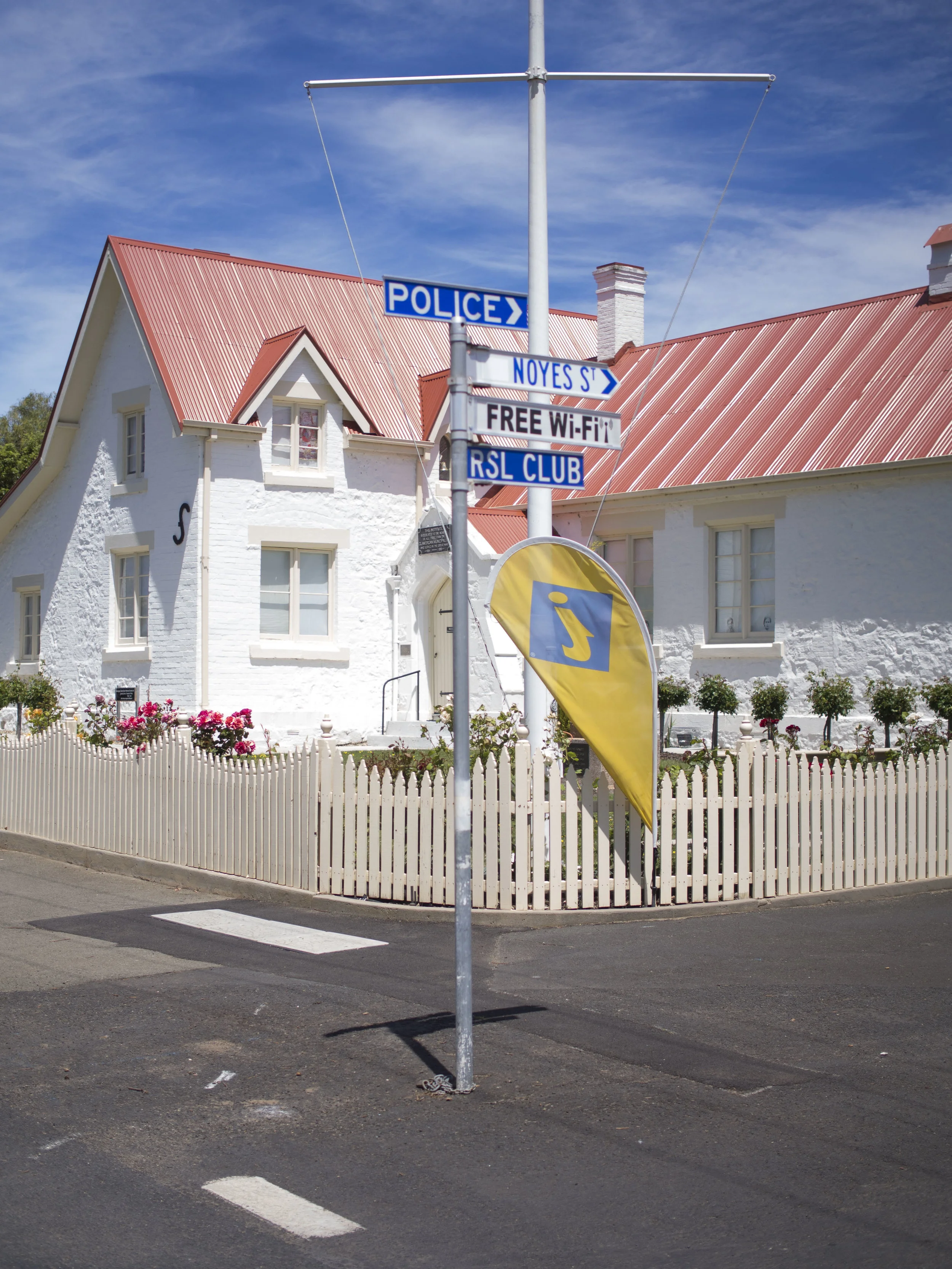 This has only been recovered with Lightroom's exposure slider (the pole is out of focus, not smeared by over exposure).