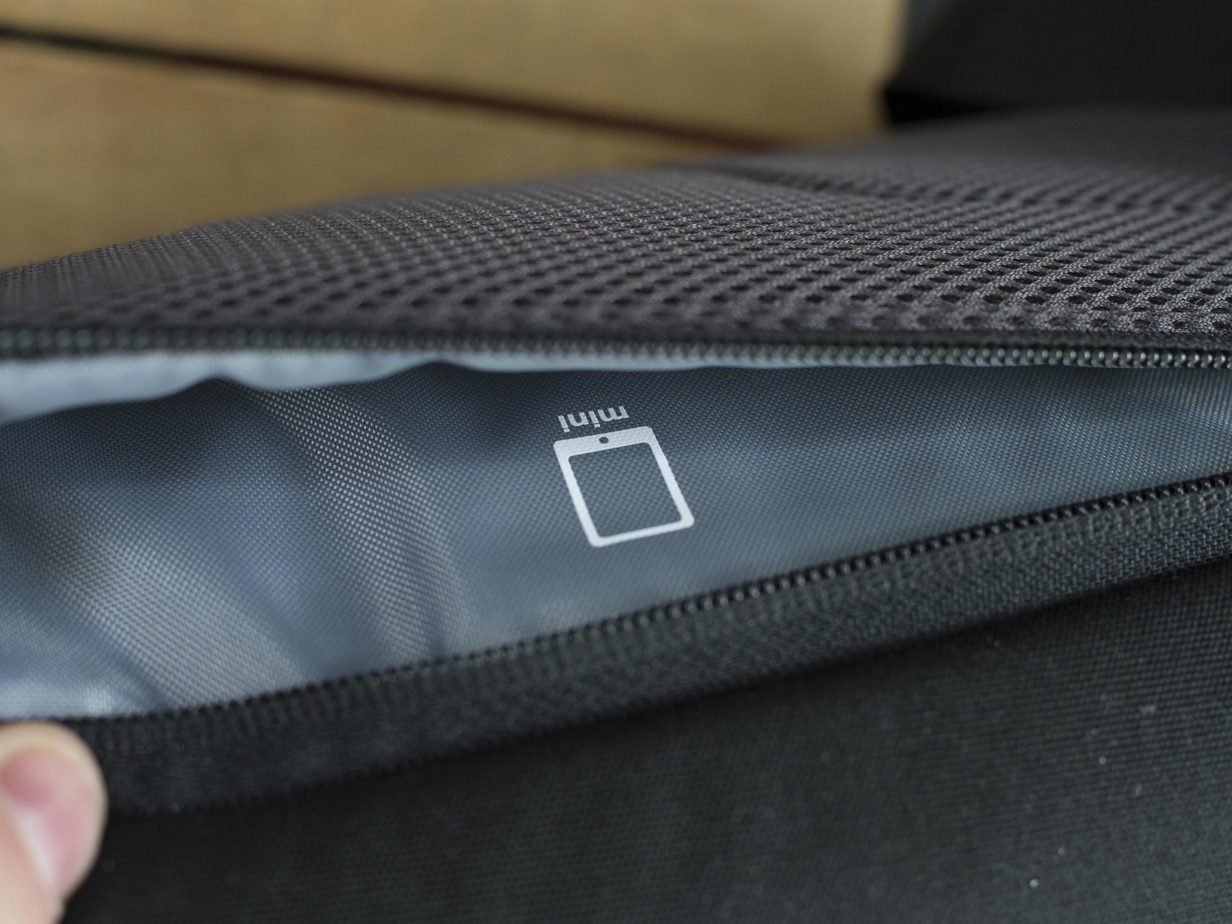 Almost a deal breaker for me, the rear padded ipad pocket will hold an ipad mini, but only “naked”. Mine is on a protective case and would not fit. This pocket is however ideal for sensitive documents being the nearest contact point to the body and well hidden.